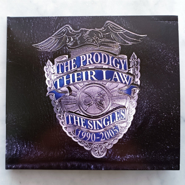 The Prodigy - Their Law: The Singles 1990-2005 (CD, Comp, RP)