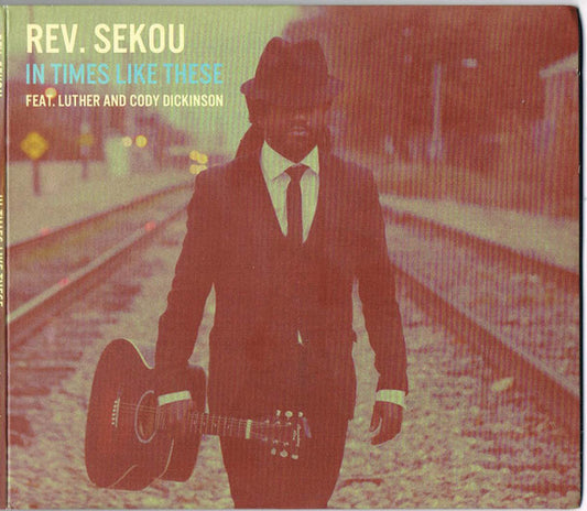 Rev. Sekou* Feat. Luther Dickinson And Cody Dickinson - In Times Like These (CD, Album, Dig)