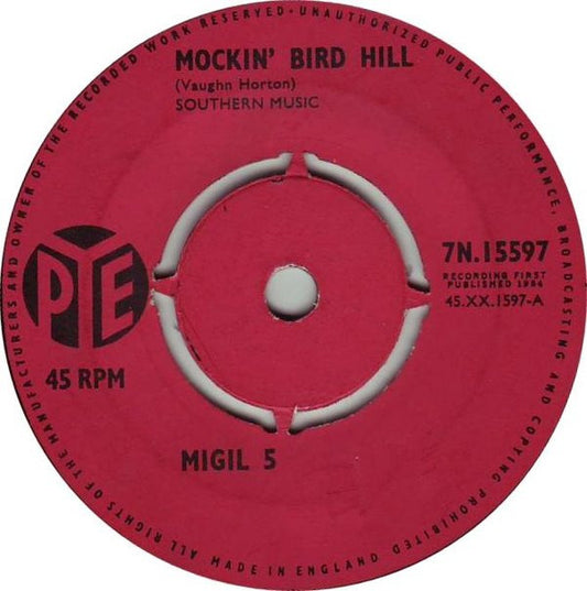 Migil 5* - Mockin' Bird Hill (7", Single, Kno)