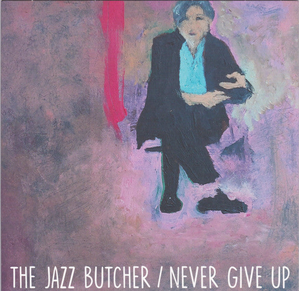 The Jazz Butcher - Never Give Up (7", Single, Gre)