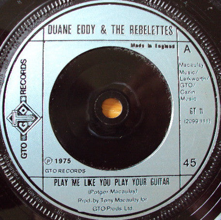 Duane Eddy & The Rebelettes - Play Me Like You Play Your Guitar (7", Single)